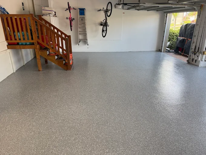 Modern garage floor with durable epoxy coating and decorative flake finish installed by garage floor coating professionals in Parrish, FL.